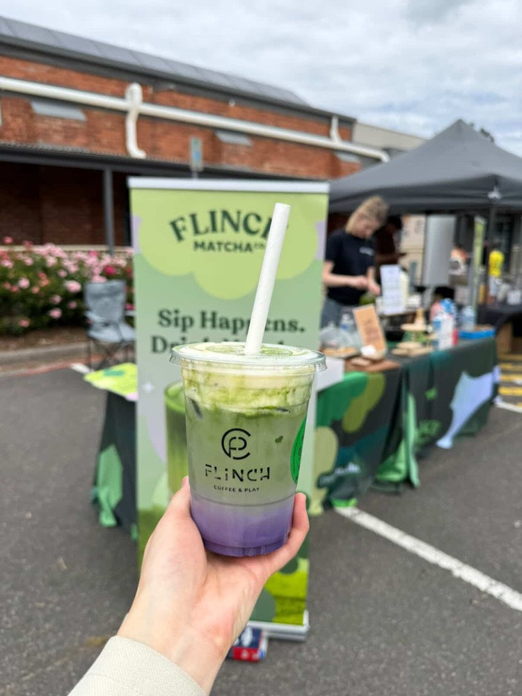 Taro and matcha layered drink from Flinch